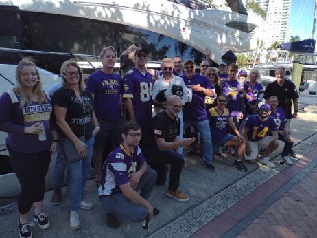 South Florida Minnesota Vikings Fans in front of a Yacht at Downtowner Saloon - MIAMI VIKES 2021