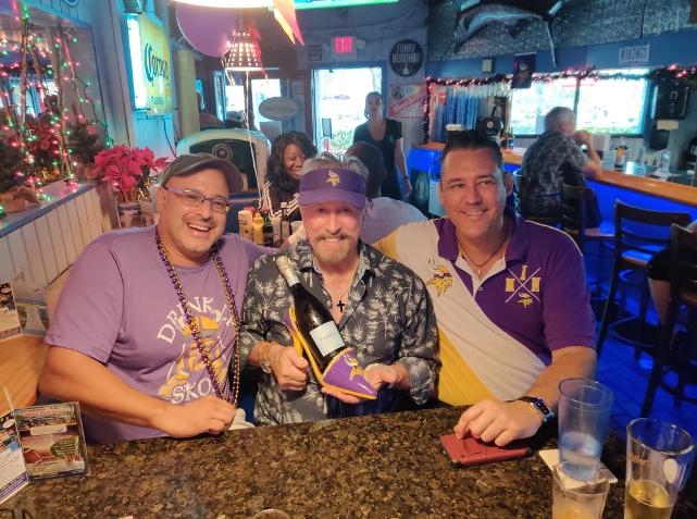 MN Vikings Fanclub President Luke Rainbow, RC the owner of the Historic Downtowner Saloon and Jay Shapiro the founder of the South Florida Can Club